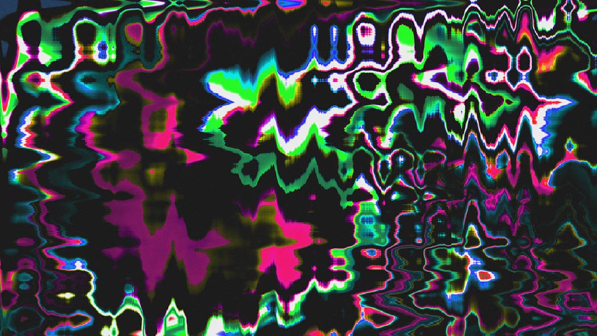 Neon green and pink glitch art with a vivid digital texture